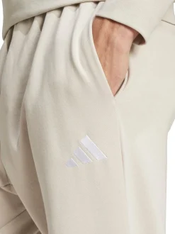 adidas Cream Essentials Feelcozy Fleece Joggers
