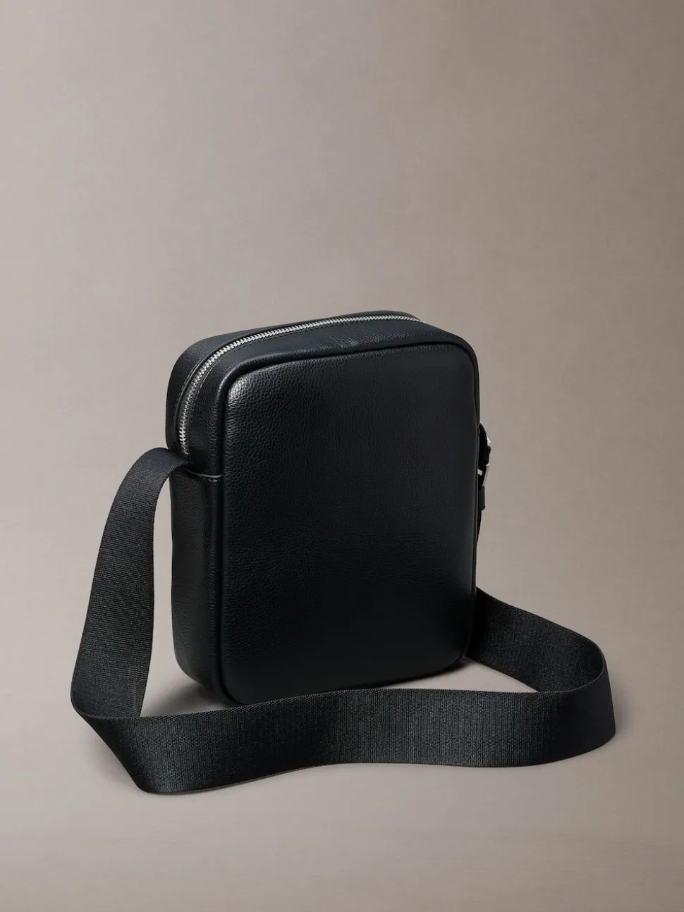 Calvin Klein Black Raised Reporter Bag