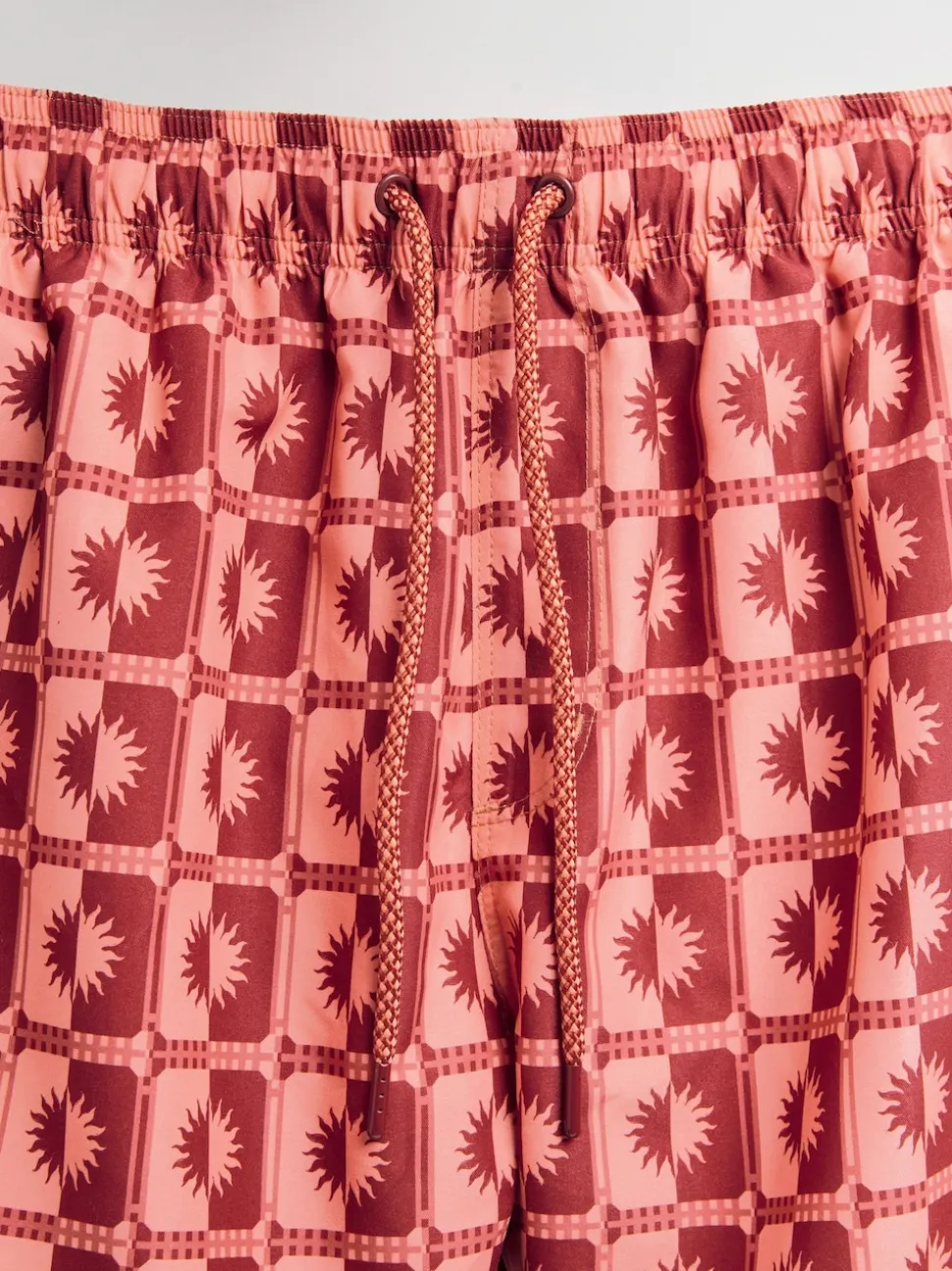 Coral Pink Sun Geometric Printed Swim Shorts