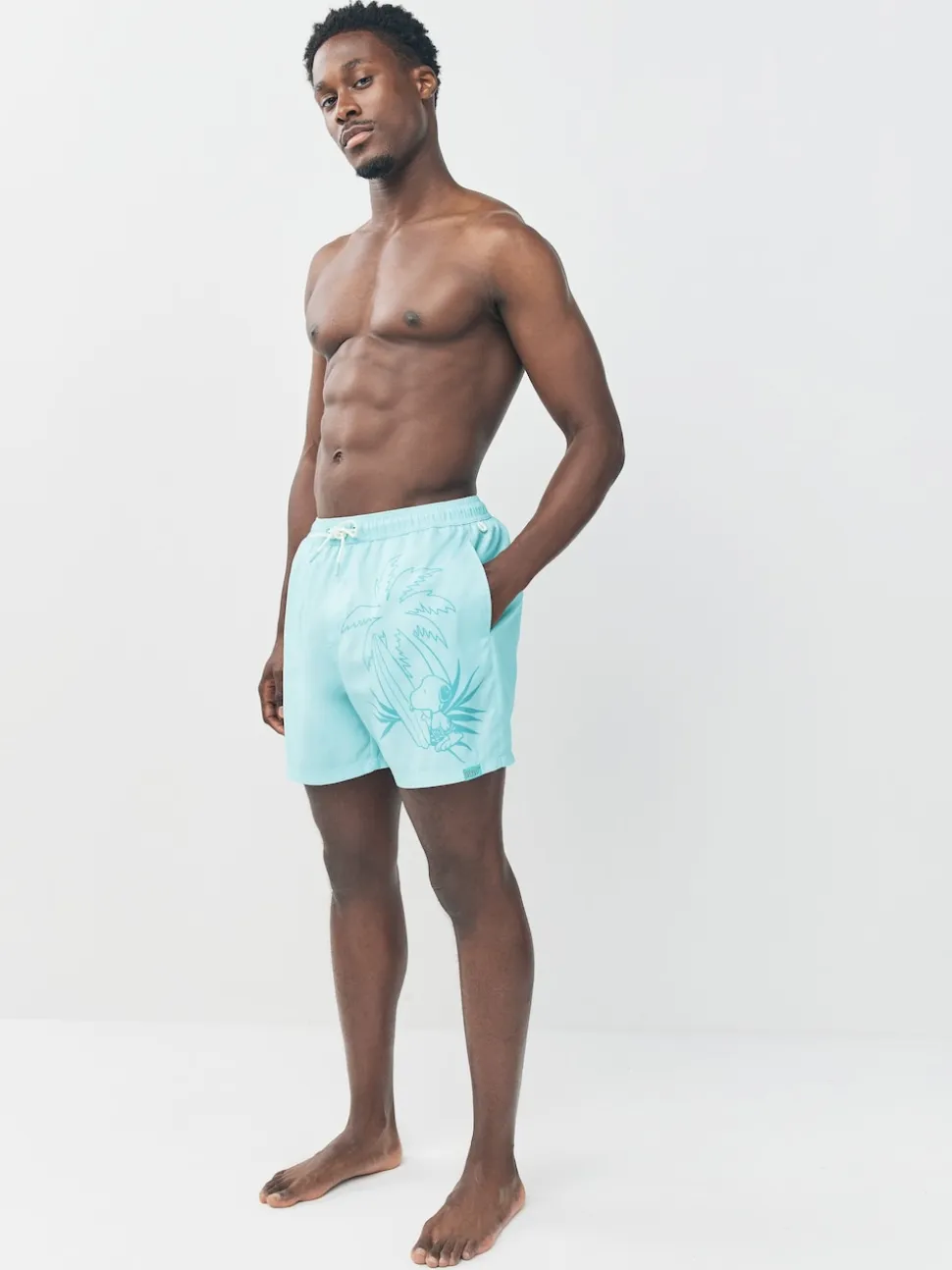 Green Snoopy License Printed Swim Shorts