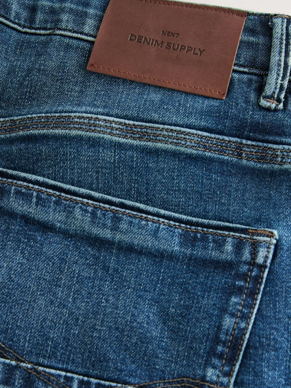 Mid Blue Relaxed Fit Authentic Stretch Denim Jeans
