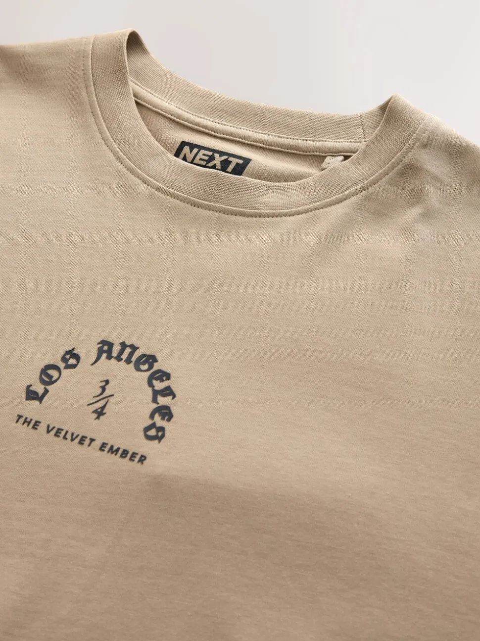 Stone Relaxed Fit Long Sleeve Graphic T-Shirt